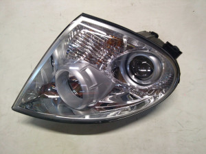 8310208B14 (SSANGYONG) Фара правая линза электрокорректором ручная регулировкаSsangYong Rexton 06-12
