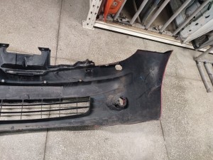 620229U40H (NISSAN) Бампер передній під омивачі фар -09