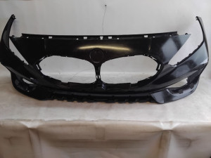51117459708 (BMW) Бампер передний под парктроник